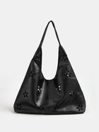 Bolso tote grande con calados florales
