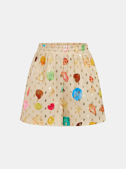 Conjunto de dos piezas con estampado de conchas y lunares dorados