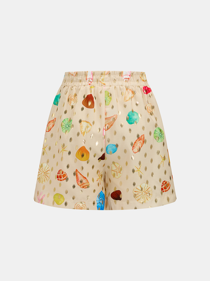 Conjunto de dos piezas con estampado de conchas y lunares dorados