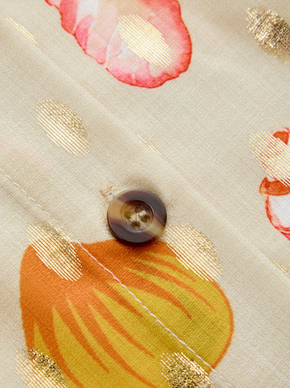 Conjunto de dos piezas con estampado de conchas y lunares dorados