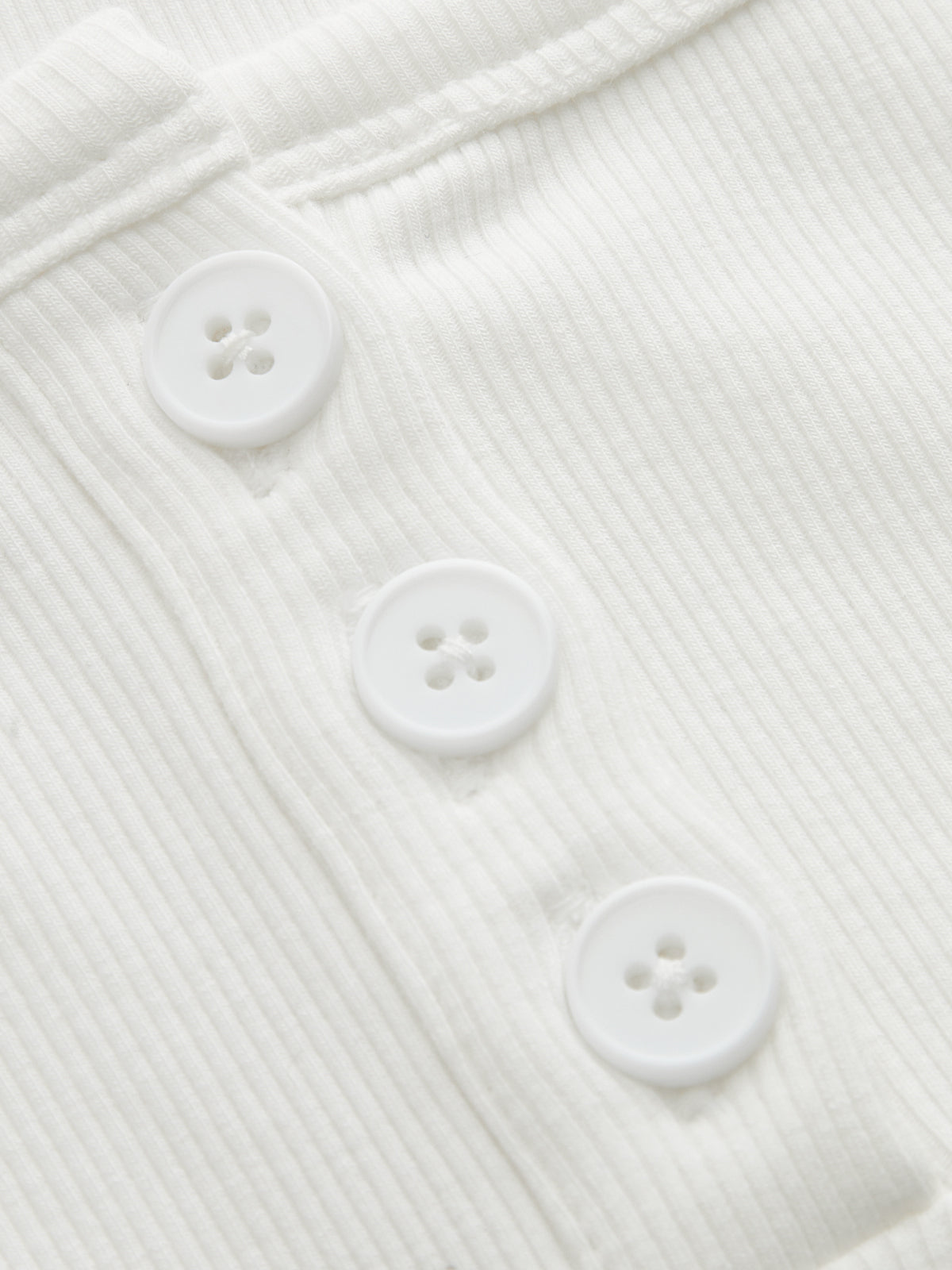 Top henley de canalé de manga corta