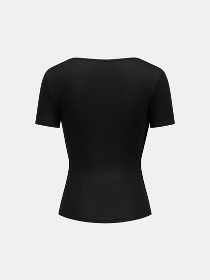Blusa de manga corta drapeada efecto dos piezas