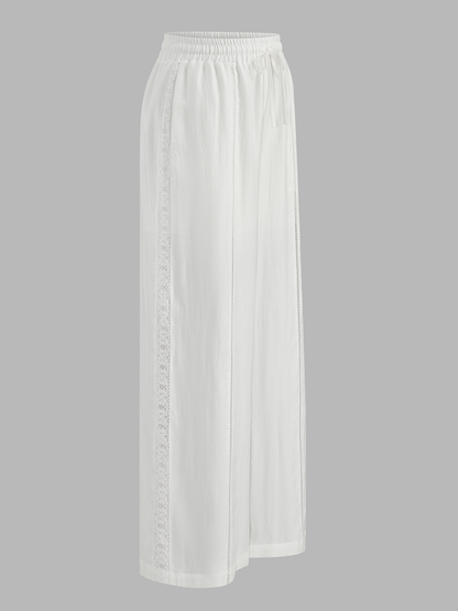 Pantalón ancho de tiro medio con cintura ajustable y calados