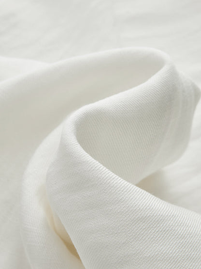 Pantalón ancho de tiro medio con cintura ajustable y calados