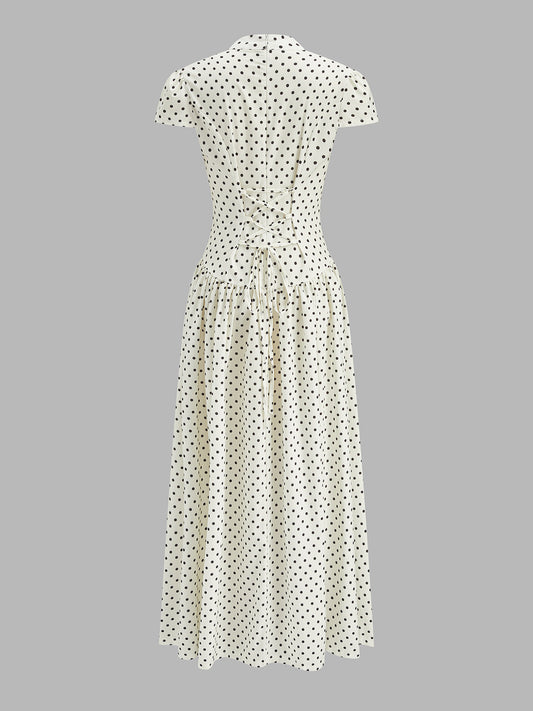 Vestido Midi de Lunares con Cuello Perkins y Manga Corta