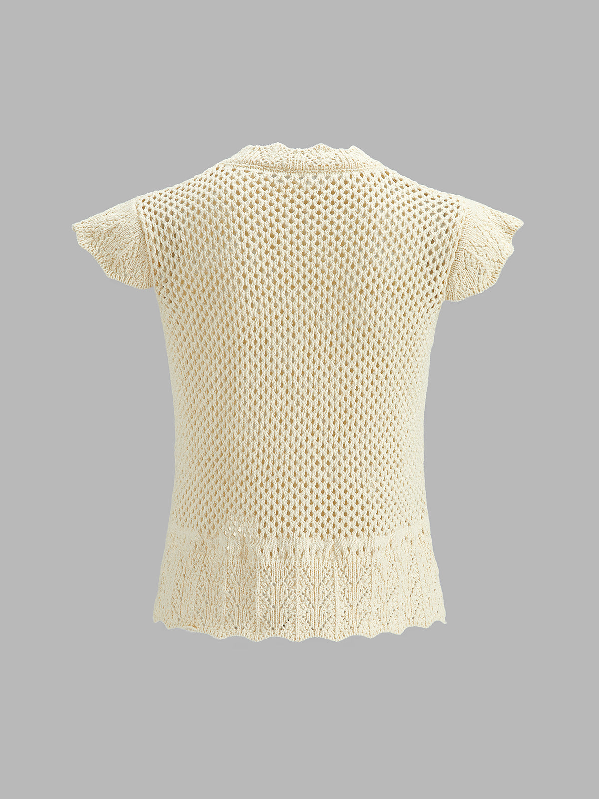 Top de punto de crochet calado con manga corta