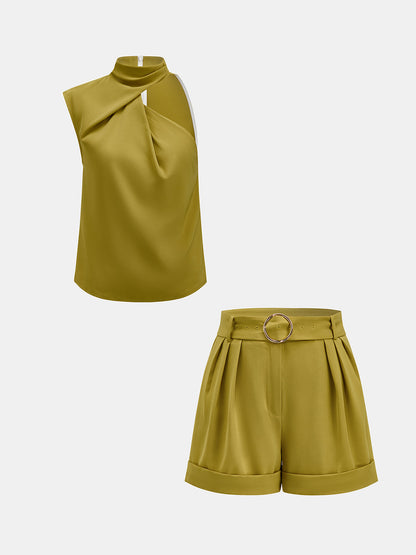 Conjunto de top de escote asimétrico y short con cinturón
