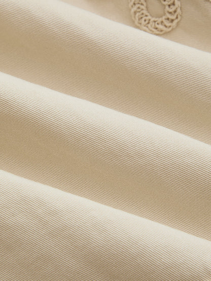 Vestido mini sin mangas bordado con aberturas
