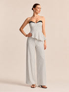 Conjunto de top peplum a rayas con encaje y pantalón