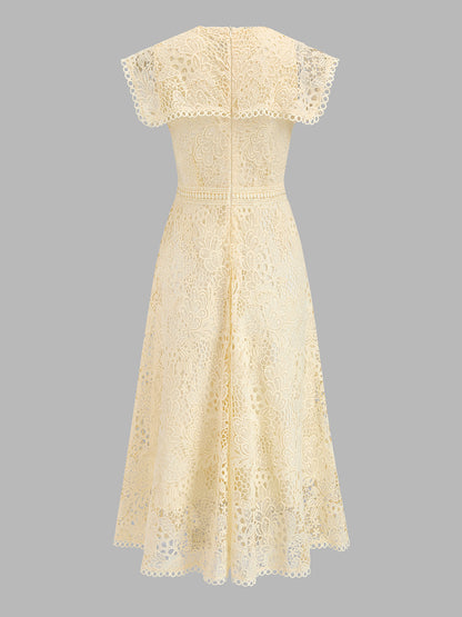 Vestido midi de encaje con cuello capa anudado
