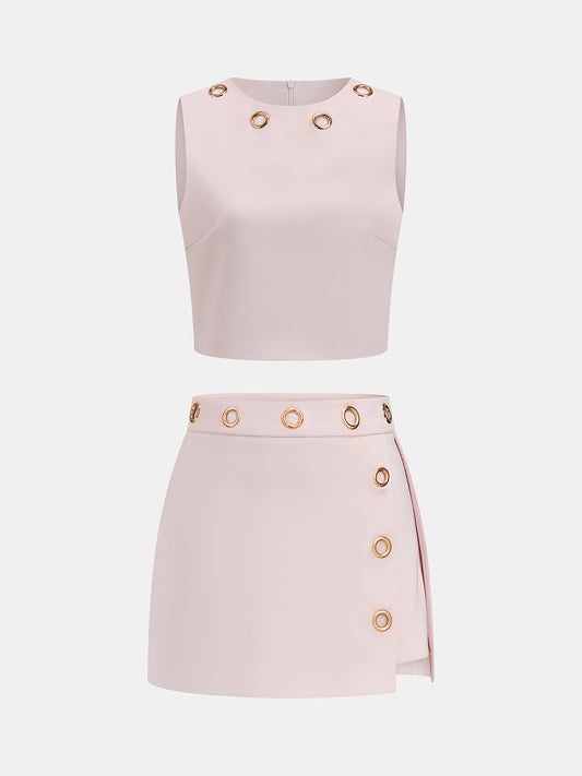 Conjunto de dos piezas con ojales metálicos: top y falda
