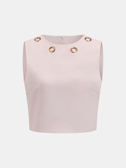 Conjunto de dos piezas con ojales metálicos: top y falda