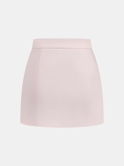 Conjunto de dos piezas con ojales metálicos: top y falda