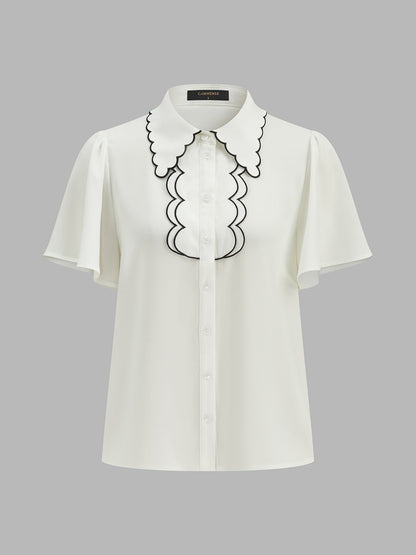 Blusa de manga farol con borde ondulado en contraste
