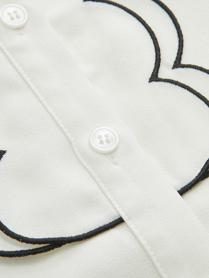 Blusa de manga farol con borde ondulado en contraste
